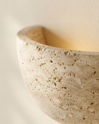 Wabi-Sabi Travertine Wall Sconce close-up detail, natural stone texture and travertine grain