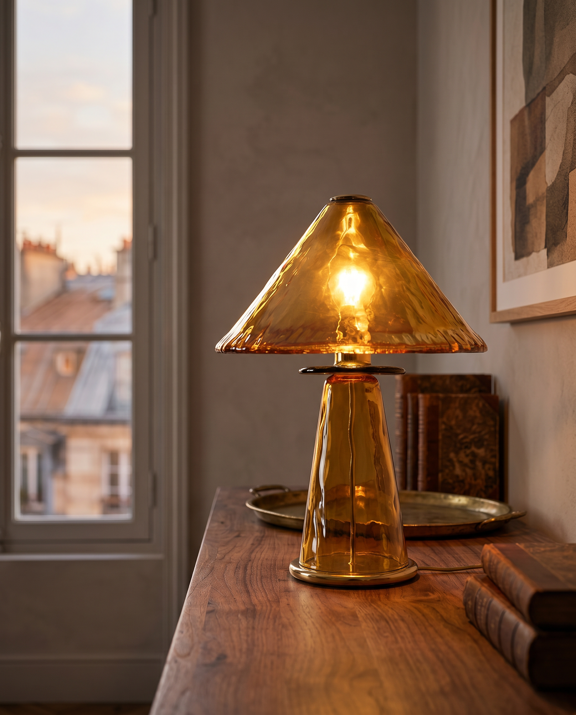 Retro Amber Glass Table Lamp — low three-quarter angle in a Parisian apartment, curved amber glass silhouette