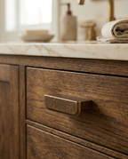 Antique Bronze Drawer Pull, Zinc Alloy — mounted on a marble bathroom vanity drawer in a refined bathroom