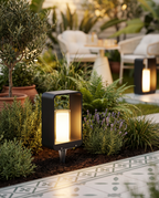 Solar LED Outdoor Lawn Light, Die-Cast Aluminum — hero in garden terrace at dusk
