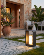 Solar LED Outdoor Lawn Light, Die-Cast Aluminum — at a villa patio edge in the evening