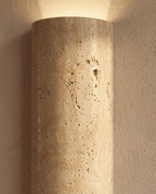 Travertine Stone LED Wall Sconce, G9 — macro detail, warm side light, natural travertine stone grain