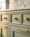 Brass Round Knobs and T-Bar Pulls, Solid Brass — round knobs and T-bar pulls installed, luxury kitchen cabinet, warm natural daylight hero