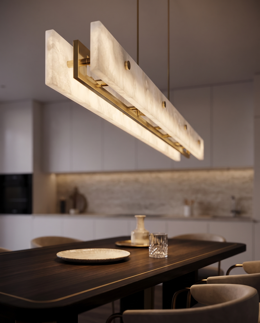 Marble Linear Pendant Light, Gold Wedge LED — alternate three-quarter angle, over a dining table, marble form with brass mounting