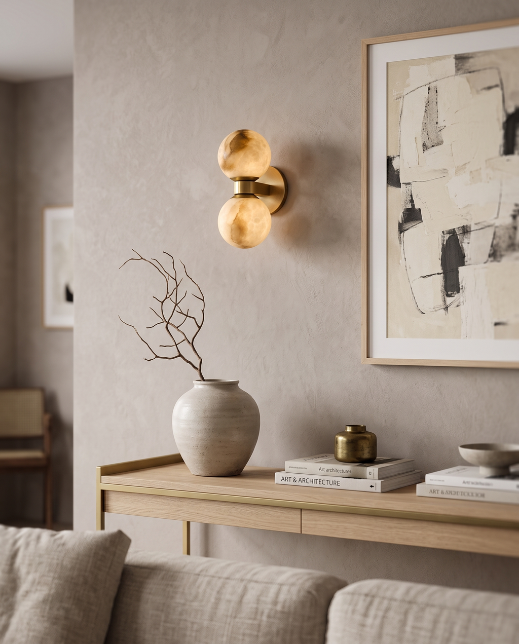 Marble Dual-Globe Wall Lamp, Gold Finish — placement and scale with console and art