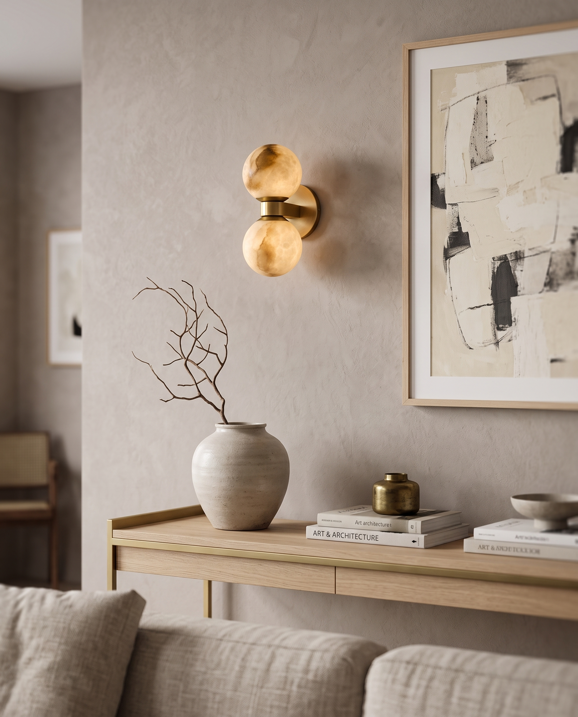 Marble Dual-Globe Wall Lamp, Gold Finish — placement and scale with console and art