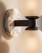Marble Dual-Globe Wall Lamp, Gold Finish — macro detail of marble veining and globe