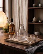 Glass Sake and Bar Serving Set, 6-Piece — evening pour mood, minimalist Japanese home bar, warm low light