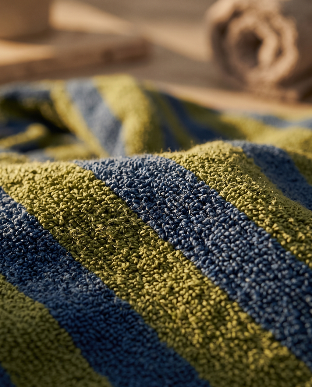 Blue and Green Striped Jacquard Cotton Robe — macro detail of the jacquard weave, warm side light, woven texture