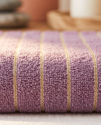 Lavender Striped Combed Cotton Towel Set — macro of the soft cotton terry weave and crisp stripe, warm side light