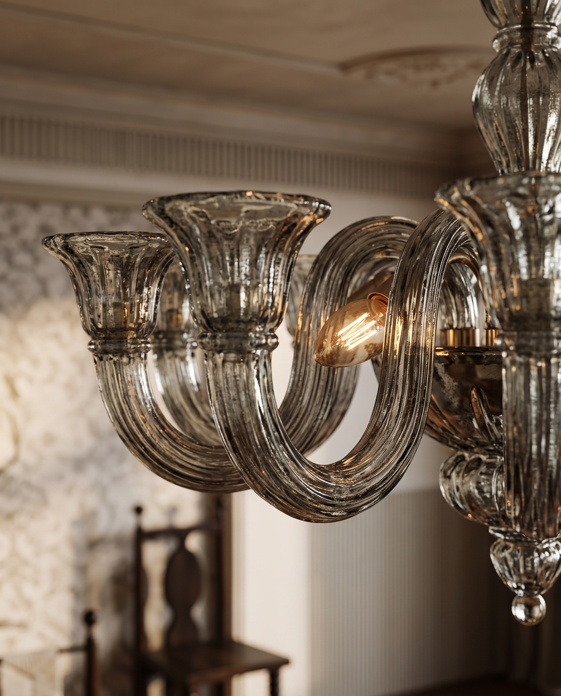 Gray Glass Oval Chandelier, Stainless Steel — macro detail, aged gray glass texture, warm side light