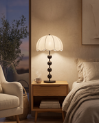 Mushroom Lamp, Walnut Wood Base and Fabric Shade — bedroom reading corner in the evening with warm glow on a nightstand