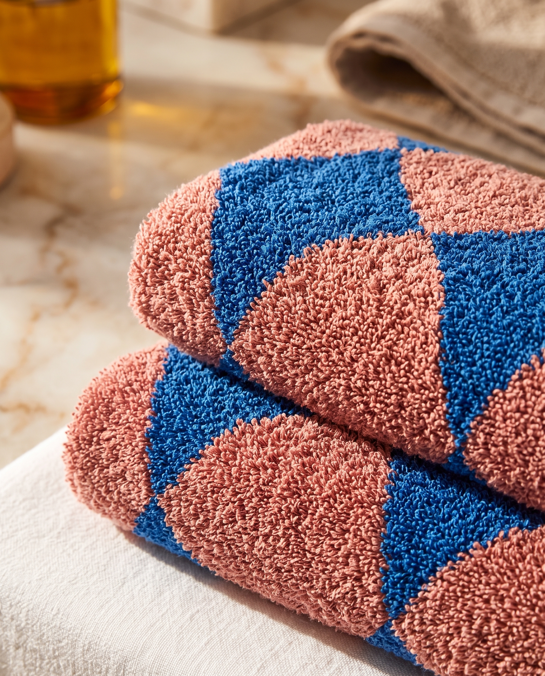 Blue Diamond Pattern Cotton Bath Towel Set — macro cotton weave detail, luxury spa, warm side light