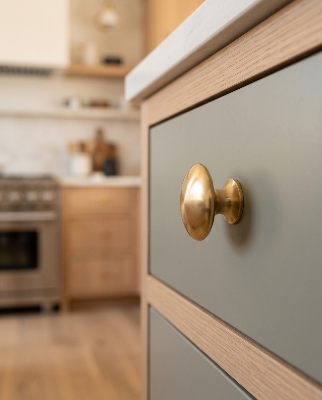 Brass Mushroom Cabinet Knob — low side angle mounted view, modern luxury kitchen, curved brass profile