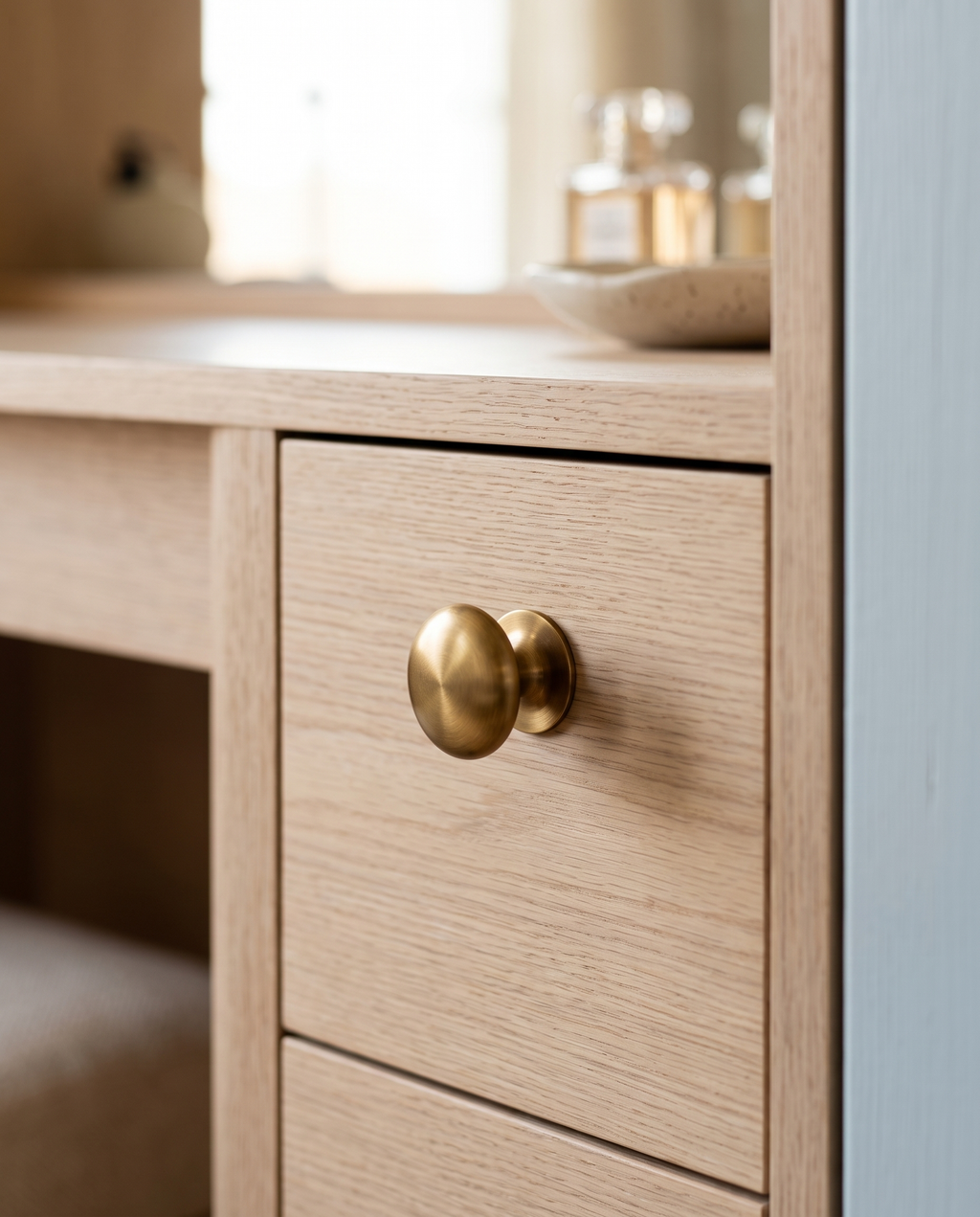 Brass Mushroom Cabinet Knob — installed on pale oak vanity wardrobe drawer, warm bedroom interior