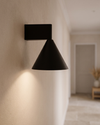 Black Cone Up and Down Wall Sconce, Aluminum — alternate angle, hallway wall, sculptural cone form
