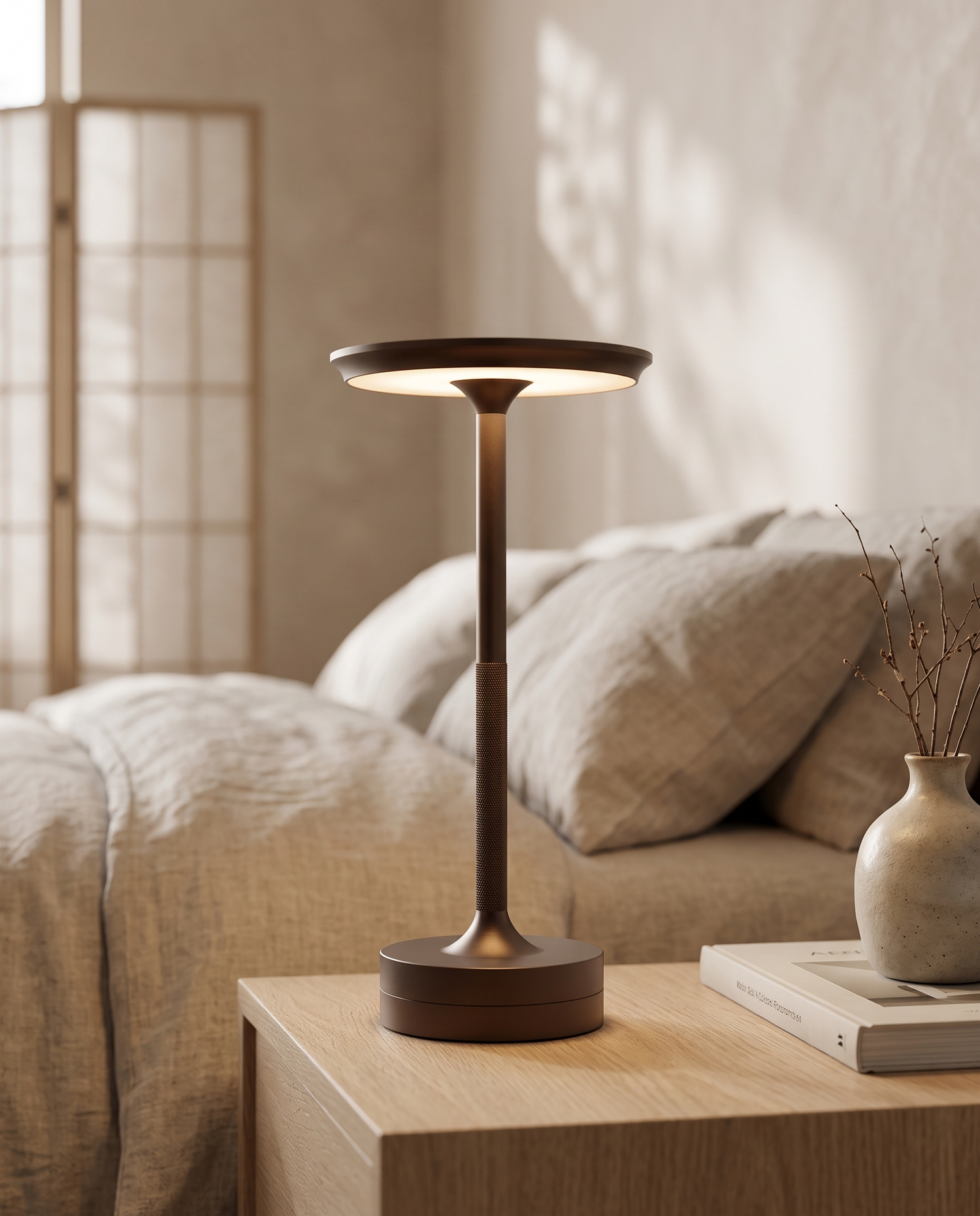 AuraTap Touch LED Lamp — glowing on a bedside table, modern Japandi bedroom, warm ambient light