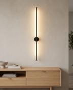Linear LED Wall Lamp, Minimalist Aluminum — Black, above a console for scale
