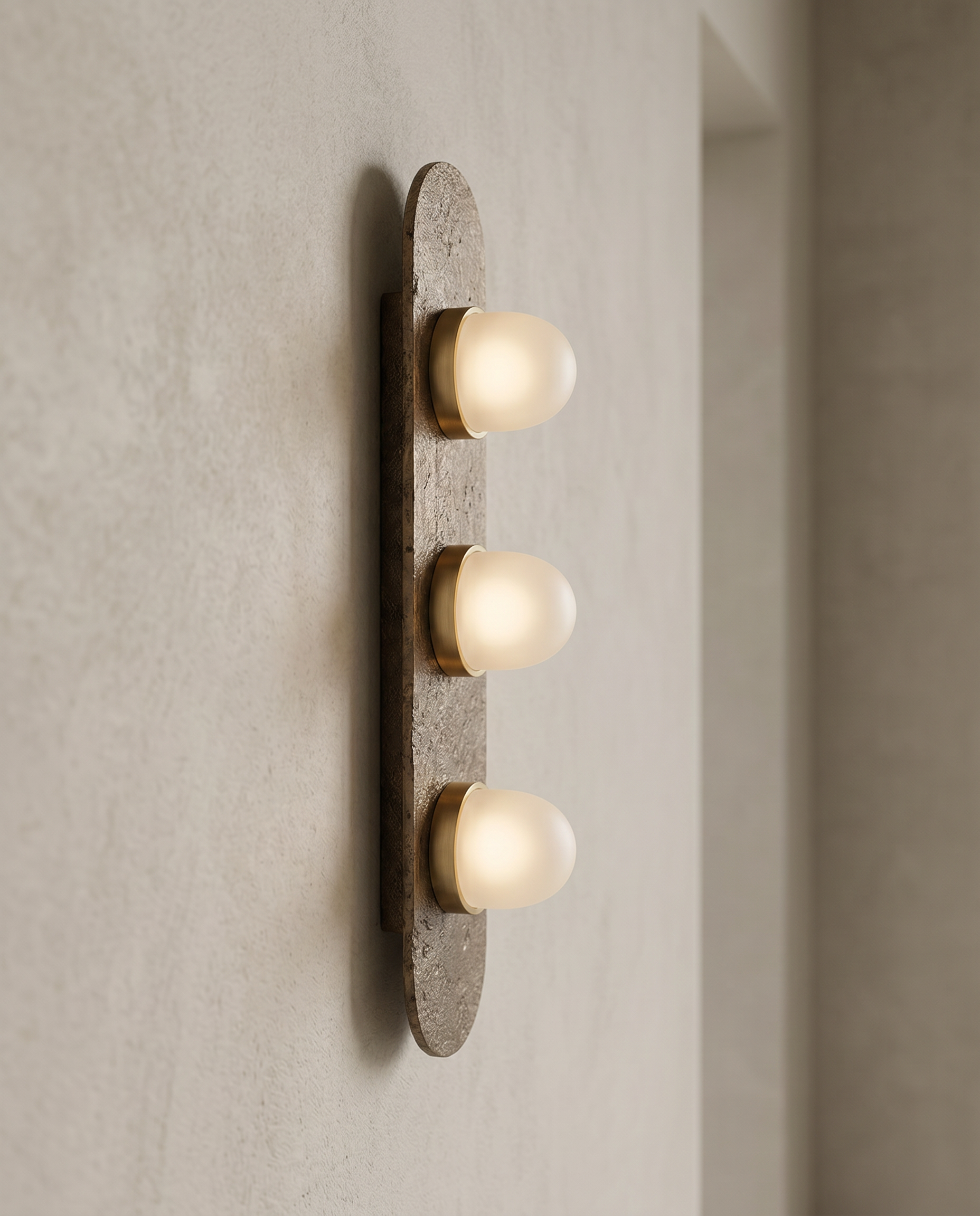 Minimalist Glass and Stone Wall Sconce, Copper — alternate angle showing 3D form, neutral wall