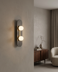 Minimalist Glass and Stone Wall Sconce, Copper — placement and scale, wall view with furniture