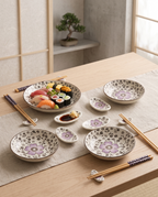 Cherry Blossom Sushi Dinnerware Set — styled meal with plated sushi, calm Japanese dining room on pale oak table