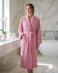 Pinstripe Jacquard Organic Cotton Robe — Pink & White, woman wearing robe, luxury spa hotel bathroom