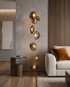 Sculptural Glass Floor Lamp, LED — full lamp in context for scale, modern luxury living room