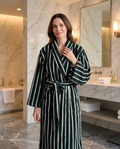Dark Stripe Jacquard Cotton Bathrobe — green, on adult model, luxury spa hotel bathroom