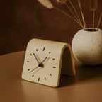 Square Ceramic Desk Clock, Silent — group of four colourways together, on a long light oak shelf in a refined minimal interior
