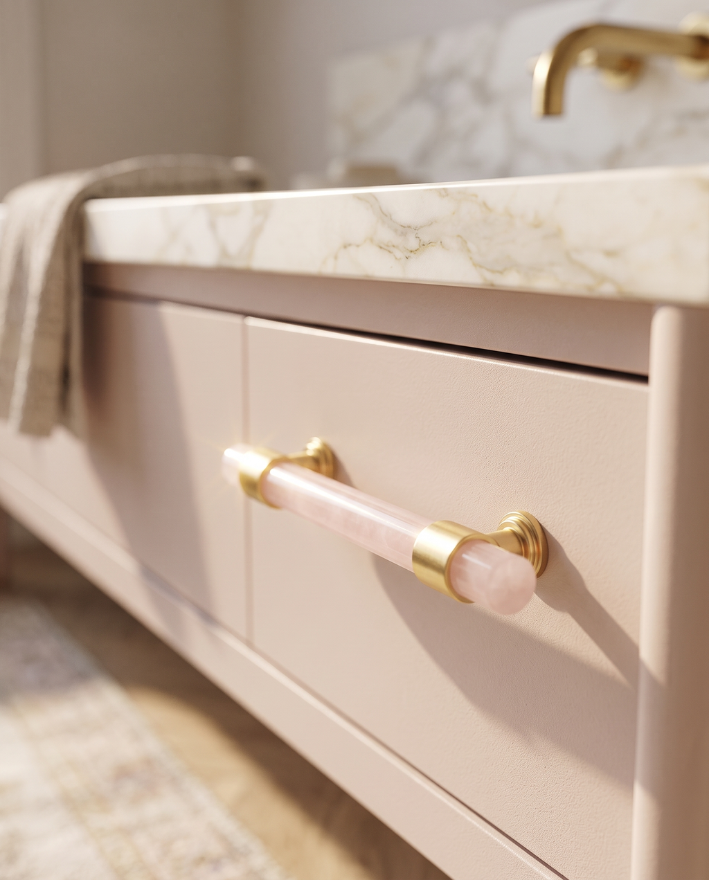 Stone and Brass T-Bar Cabinet Hardware — Pink knob, mounted on luxe marble vanity cabinetry