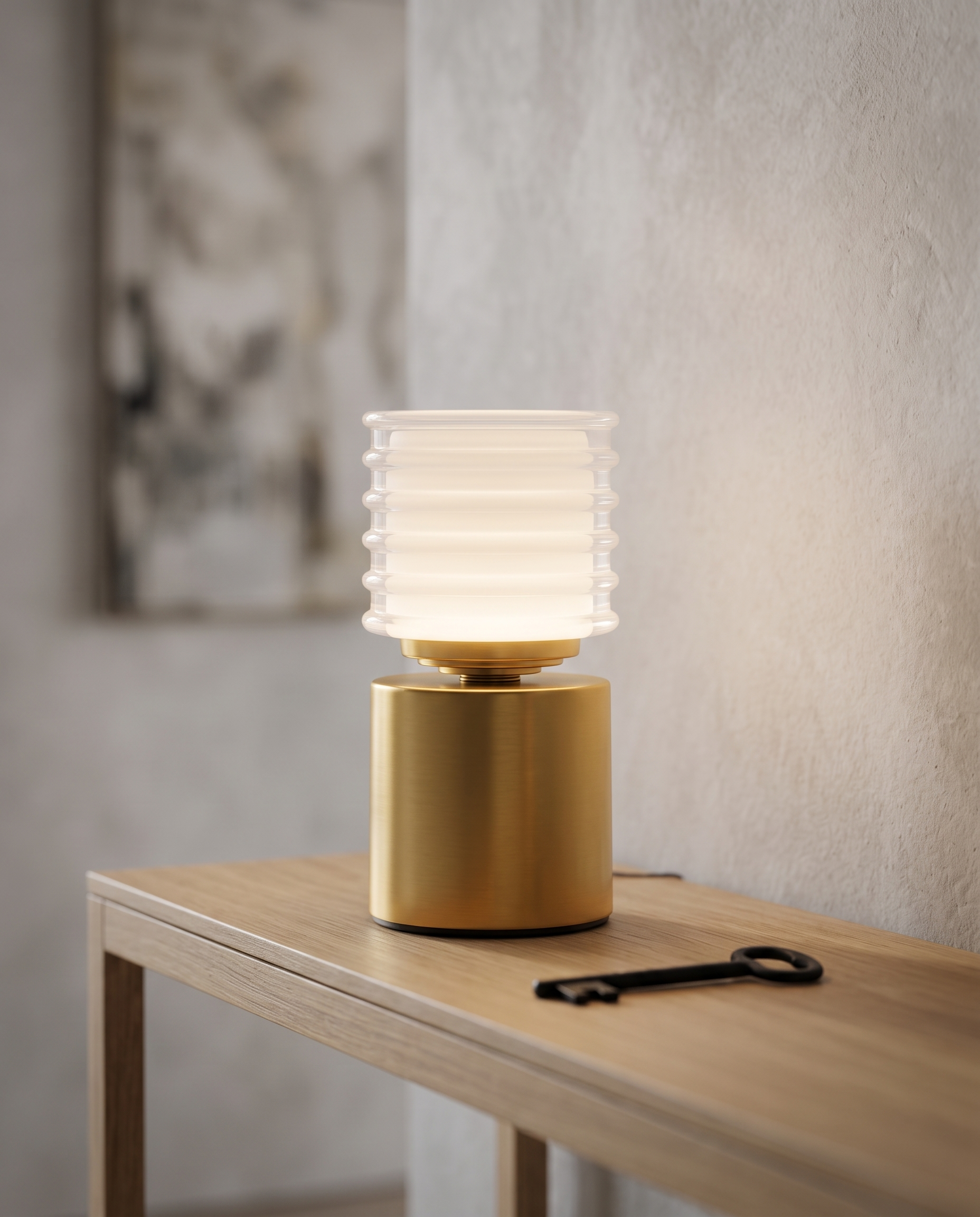 Rechargeable Acrylic Diffuser Table Lamp, Touch Dimming — Gold, glowing on a modern console table