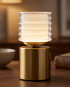 Rechargeable Acrylic Diffuser Table Lamp, Touch Dimming — macro detail of gold metal form and warm ribbed acrylic glow