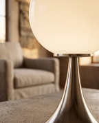 Glass Globe Touch Table Lamp, Dimmable LED — detail macro of glass orb and metal base, warm glow