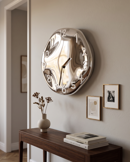 Chrome Ceramic Wall Clock, Silent Quartz — White, mounted above a hallway console