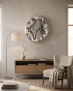 Chrome Ceramic Wall Clock, Silent Quartz — White, wall placement with furniture for scale