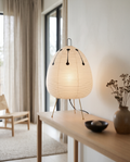 Rice Paper Shade LED Table Lamp, Minimalist — White, hero on an oak console in a serene Japandi living room