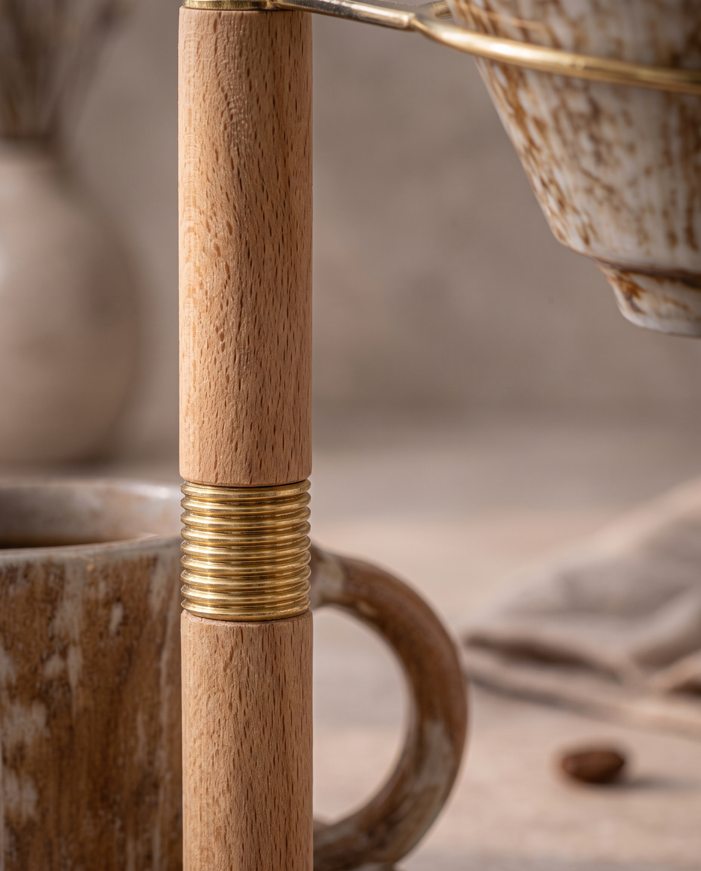 Pour-Over Coffee Dripper Set, Ceramic and Wood Stand — macro detail of glazed ceramic meeting natural wood in warm side light