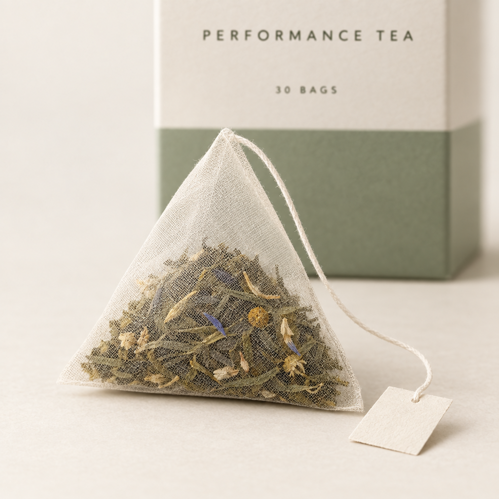 Close-up of a single pyramid bag and the loose leaf inside