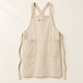 Cross-back canvas apron in Natural