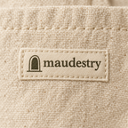 Close-up of the woven Maudestry label and canvas