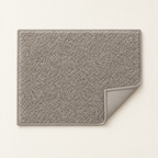 Corner folded back, showing the non-slip backing