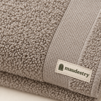 Close-up of the terry pile and woven Maudestry label
