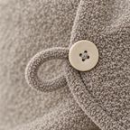 Close-up of the button and elastic loop