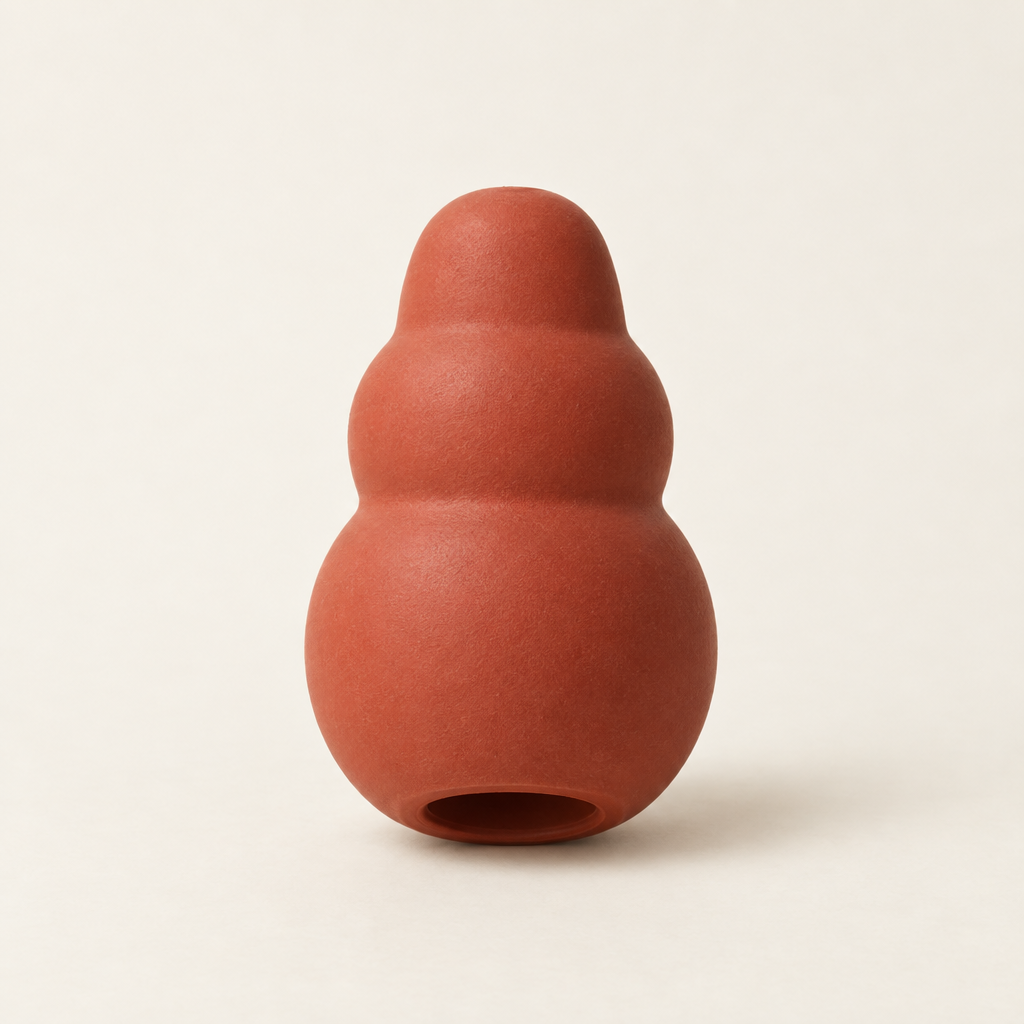 Rubber treat-dispensing dog toy