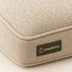 Close-up of the acrylic weave and woven Maudestry label