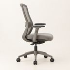 Side profile showing the lumbar curve and tilt mechanism