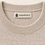Close-up of the crew neck and woven Maudestry label