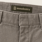 Close-up of the waistband and woven Maudestry label